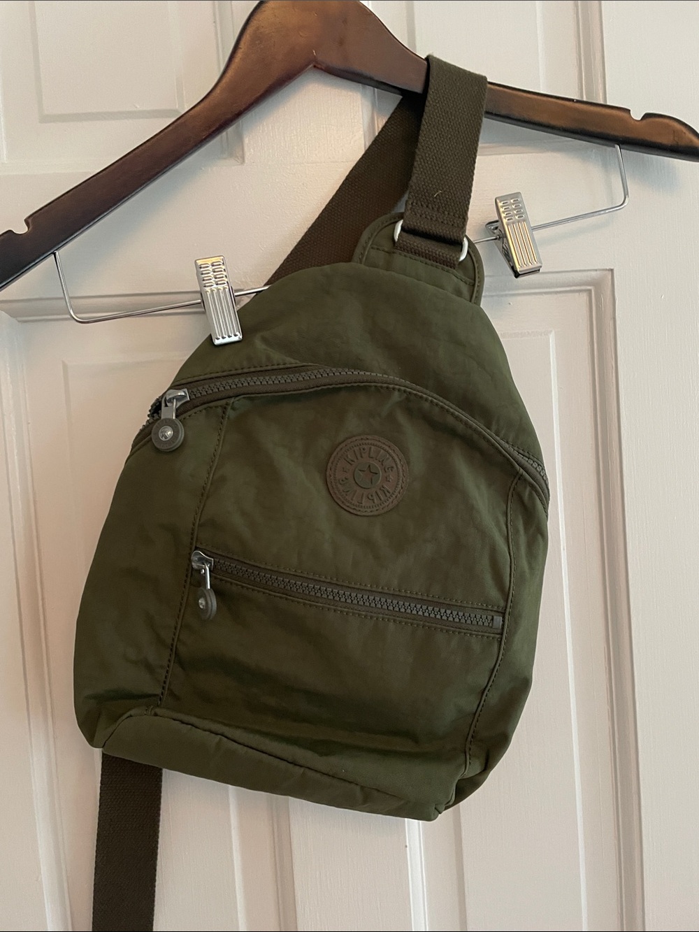 Kipling Olive Green Sling Pack with Front Zip Pocket